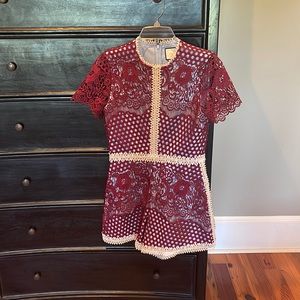 Excellent used condition. Worn twice. Size medium. Alexis romper.